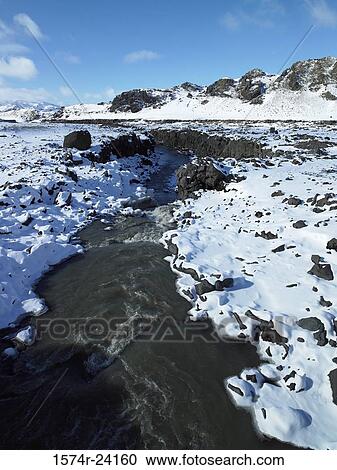 River flowing through a snow covered landscape, Emstrur River, Iceland View Large Photo Image Stock Image - River flowing through a snow covered landscape, Emstrur River, Iceland. Fotosearch
