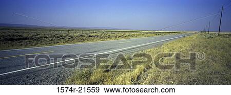 Road passing through a countryside, Highway 20, Idaho, USA View Large Photo Image Stock Photo - Road passing through a countryside, Highway 20, Idaho, USA. Fotosearch