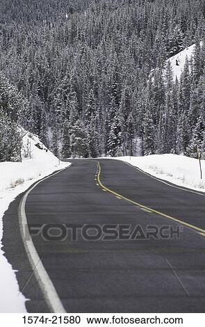 Road passing through a snow covered landscape, Highway 75, Ketchum, Idaho, USA View Large Photo Image Stock Image - Road passing through a snow covered landscape, Highway 75, Ketchum, Idaho, USA. Fotosearch