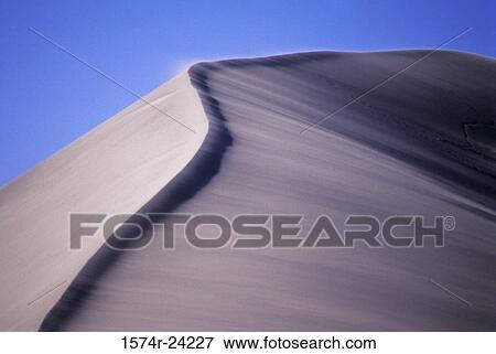 Sand dunes in a desert, Bruneau Dunes State Park, Idaho, USA View Large Photo Image Stock Photo - Sand dunes in a desert, Bruneau Dunes State Park, Idaho, USA. Fotosearch