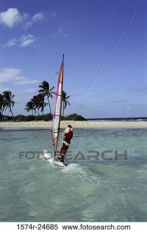 Santa Claus windsurfing View Large Photo Image Stock Photography - Santa Claus windsurfing. Fotosearch