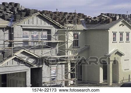 Stock Image - Scaffolding outside of a building. Fotosearch