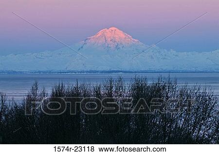 Sea in front of a volcanic mountain, Mount Redoubt, Cook Inlet, Alaska, USA View Large Photo Image Stock Photo - Sea in front of a volcanic mountain, Mount Redoubt, Cook Inlet, Alaska, USA. Fotosearch