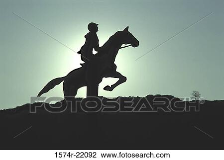 Silhouette of a person riding horseback View Large Photo Image Stock Image - Silhouette of a person riding horseback. Fotosearch