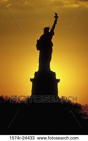 Silhouette of a statue, Statue of Liberty, New York City, New York, USA View Large Photo Image Stock Image - Silhouette of a statue, Statue of Liberty, New York City, New York, USA. Fotosearch
