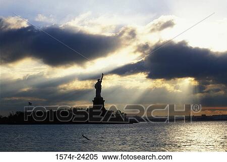 Silhouette of a statue, Statue of Liberty, New York City, New York, USA View Large Photo Image Stock Photography - Silhouette of a statue, Statue of Liberty, New York City, New York, USA. Fotosearch