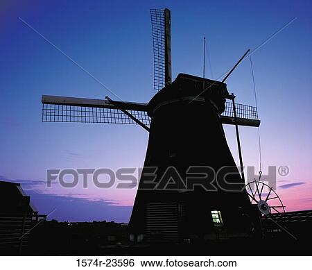 Silhouette of a traditional windmill, Lisse, Netherlands View Large Photo Image Stock Photograph - Silhouette of a traditional windmill, Lisse, Netherlands. Fotosearch