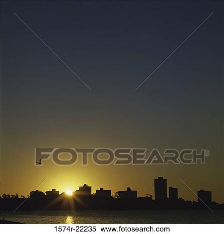 Silhouette of buildings in a city, Perth, Australia View Large Photo Image Stock Photography - Silhouette of buildings in a city, Perth, Australia. Fotosearch