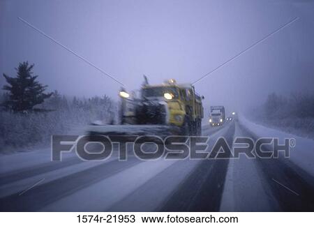 Snow plow on the road View Large Photo Image Stock Image - Snow plow on the road. Fotosearch