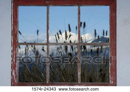 Snowcapped mountains viewed through a window View Large Photo Image Stock Image - Snowcapped mountains viewed through a window. Fotosearch
