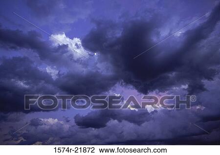 Storm clouds in the sky View Large Photo Image Stock Image - Storm clouds in the sky. Fotosearch