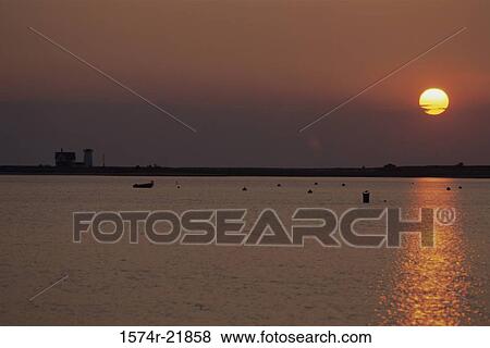 Sunrise over a lake, Chatham, Massachusetts, USA View Large Photo Image Stock Photo - Sunrise over a lake, Chatham, Massachusetts, USA. Fotosearch