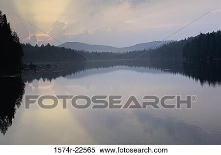 Sunrise over a lake View Large Photo Image Stock Photography - Sunrise over a lake. Fotosearch