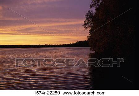 Sunset over the ocean, Minnesota, USA View Large Photo Image Stock Image - Sunset over the ocean, Minnesota, USA. Fotosearch