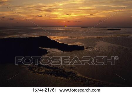 Sunset over the ocean View Large Photo Image Stock Image - Sunset over the ocean. Fotosearch