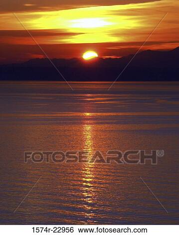 Sunset set over the ocean, Puget Sound, Washington, USA View Large Photo Image Stock Photograph - Sunset set over the ocean, Puget Sound, Washington, USA. Fotosearch