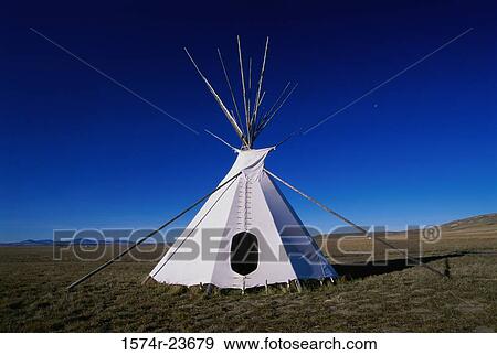 Teepee on a landscape, Ulm Pishkun State Park, Montana, USA View Large Photo Image Stock Photo - Teepee on a landscape, Ulm Pishkun State Park, Montana, USA. Fotosearch