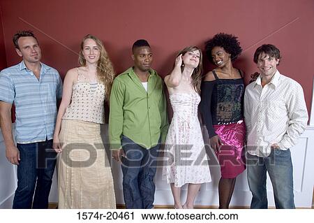 Three young couples standing side by side View Large Photo Image Stock Image - Three young couples standing side by side. Fotosearch