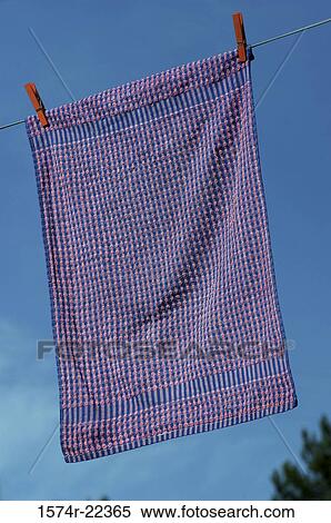 Towel drying on a clothesline View Large Photo Image Stock Photography - Towel drying on a clothesline. Fotosearch