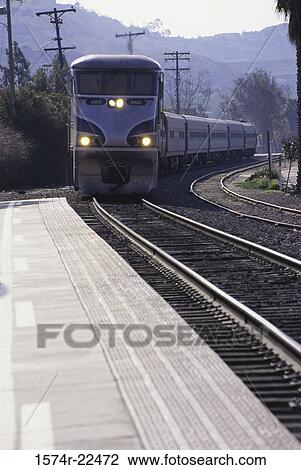 Train entering a station View Large Photo Image Stock Image - Train entering a station. Fotosearch
