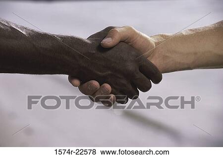 Two people shaking hands View Large Photo Image Stock Photo - Two people shaking hands. Fotosearch