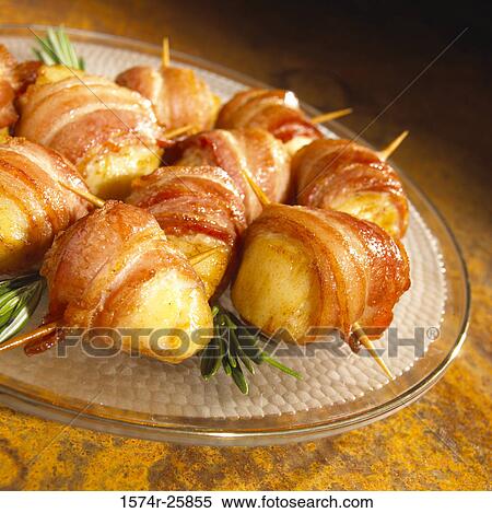 Bacon wrapped scallops on a plate View Large Photo Image Stock Photography - Bacon wrapped scallops on a plate. Fotosearch