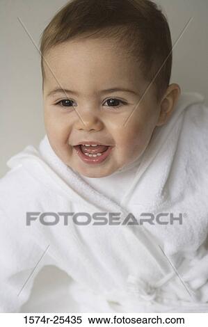 Close-up of a baby smiling View Large Photo Image Stock Photography - Close-up of a baby smiling. Fotosearch