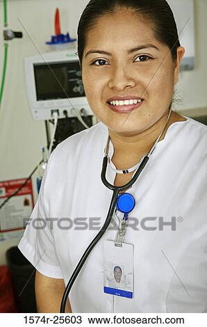Stock Image - Close-up of a female nurse smiling. Fotosearch