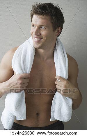 Close-up of a mid adult man with a towel around his neck View Large Photo Image Stock Image - Close-up of a mid adult man with a towel around his neck. Fotosearch