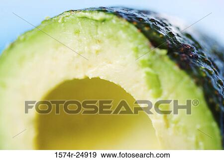 Close-up of a sliced avocado View Large Photo Image Stock Photo - Close-up of a sliced avocado. Fotosearch