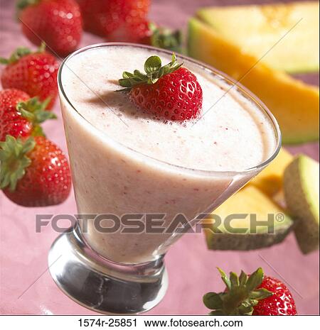 Close-up of a smoothie with a strawberry in it View Large Photo Image Stock Image - Close-up of a smoothie with a strawberry in it. Fotosearch