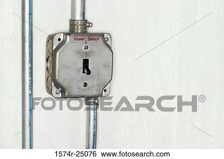 Close-up of an electric switch on a wall View Large Photo Image Stock Photograph - Close-up of an electric switch on a wall. Fotosearch