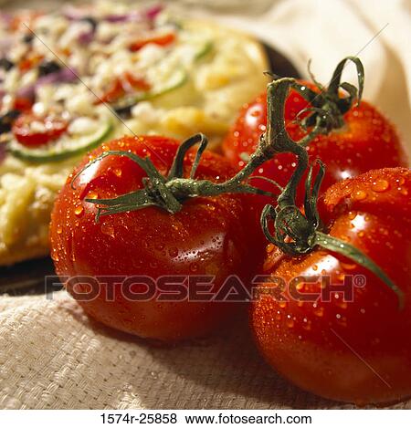 Close-up of three cherry tomatoes View Large Photo Image Stock Photo - Close-up of three cherry tomatoes. Fotosearch