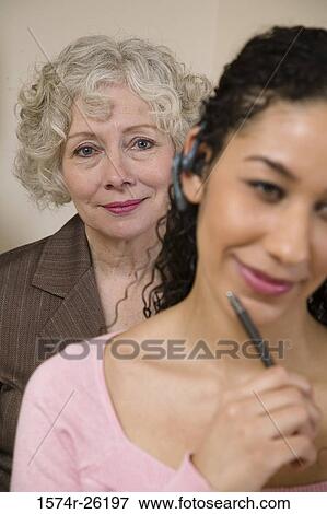 Close-up of two businesswomen View Large Photo Image Stock Photo - Close-up of two businesswomen. Fotosearch