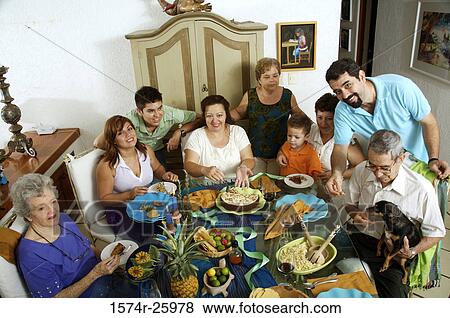 High angle view of a family at the dining table View Large Photo Image Stock Photo - High angle view of a family at the dining table. Fotosearch
