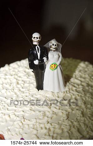 High angle view of wedding cake figurines on a wedding cake View Large Photo Image Picture - High angle view of wedding cake figurines on a wedding cake. Fotosearch