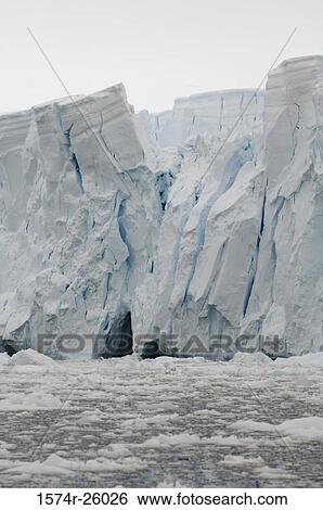 Ice floe floating on water View Large Photo Image Stock Photograph - Ice floe floating on water. Fotosearch