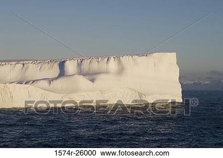 Iceberg floating on water View Large Photo Image Stock Image - Iceberg floating on water. Fotosearch