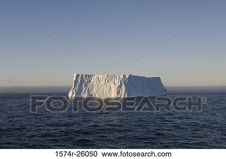 Iceberg floating on water View Large Photo Image Stock Image - Iceberg floating on water. Fotosearch