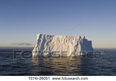 Iceberg floating on water View Large Photo Image Stock Image - Iceberg floating on water. Fotosearch