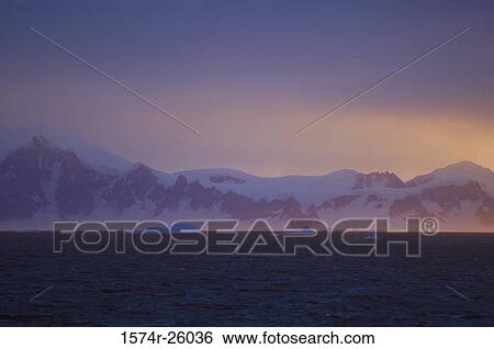 Iceberg floating on water View Large Photo Image Stock Photograph - Iceberg floating on water. Fotosearch