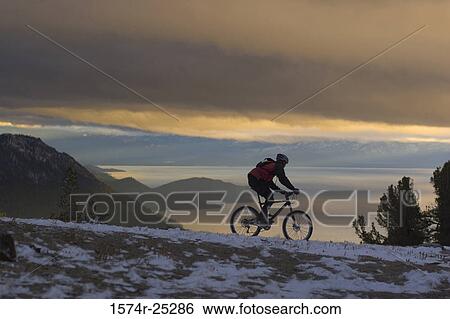 Man riding a mountain bike View Large Photo Image Stock Photograph - Man riding a mountain bike. Fotosearch