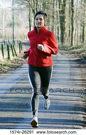 Mature woman running View Large Photo Image Stock Image - Mature woman running. Fotosearch