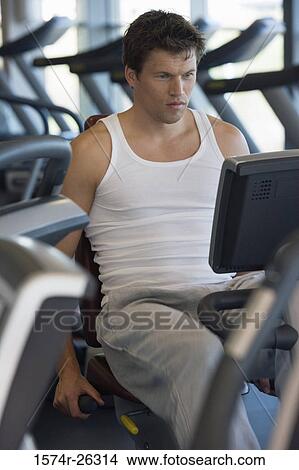 Mid adult man exercising View Large Photo Image Picture - Mid adult man exercising. Fotosearch