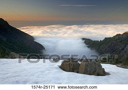 Mountains surrounded by clouds, Klahhane Ridge, Olympic National Park, Washington, USA View Large Photo Image Stock Image - Mountains surrounded by clouds, Klahhane Ridge, Olympic National Park, Washington, USA. Fotosearch