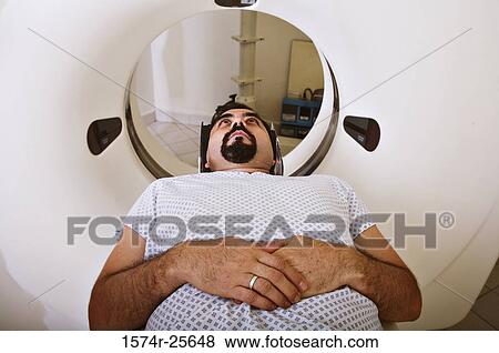 Patient getting an MRI scan View Large Photo Image Stock Photo - Patient getting an MRI scan. Fotosearch