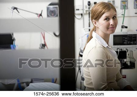 Patient sitting in a hospital room View Large Photo Image Stock Photograph - Patient sitting in a hospital room. Fotosearch