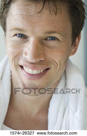 Portrait of a mid adult man with a towel around his neck View Large Photo Image Stock Photo - Portrait of a mid adult man with a towel around his neck. Fotosearch