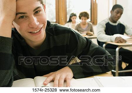Portrait of a student in a classroom View Large Photo Image Stock Photo - Portrait of a student in a classroom. Fotosearch