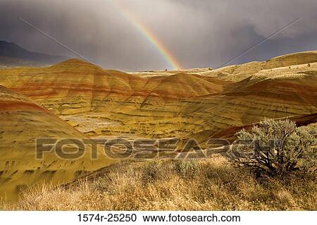 Rainbow over hills, Painted Hills, John Day Fossil Beds National Monument, Oregon, USA View Large Photo Image Stock Image - Rainbow over hills, Painted Hills, John Day Fossil Beds National Monument, Oregon, USA. Fotosearch